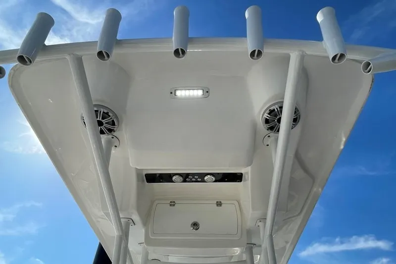 Slide: The Image of 2017 Sea Fox 248 Commander boat T-top with rod holders and speakers. - 15