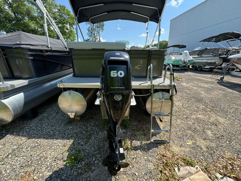 Slide: The Image of 2024 Crest Classic LX 220 pontoon boat with Mercury 60 outboard motor. - 4