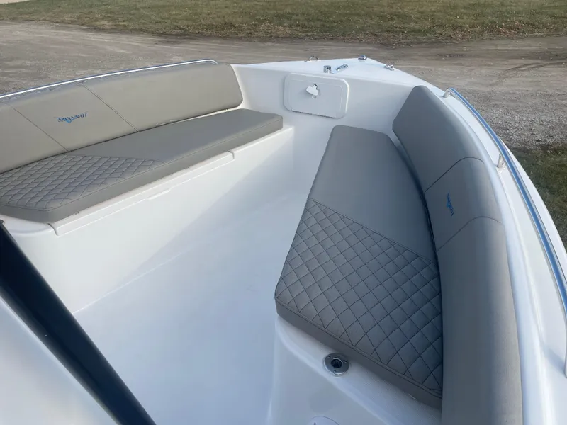 Slide: The Image of 2024 Savannah 2200 Offshore boat with cushioned seating in the bow area. - 4