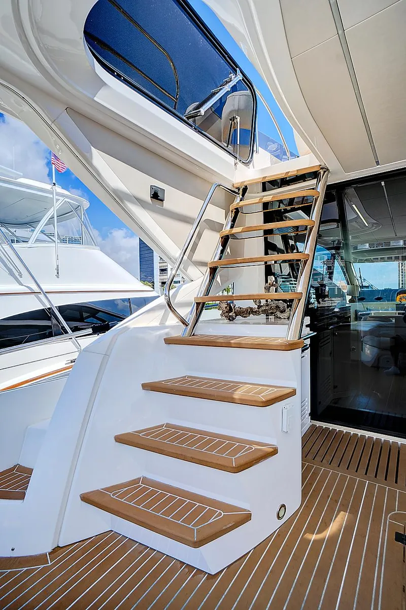 Slide: The Image of 2017 Sunseeker 68 Sport Yacht, teak stairs to upper deck, luxury interior. - 18