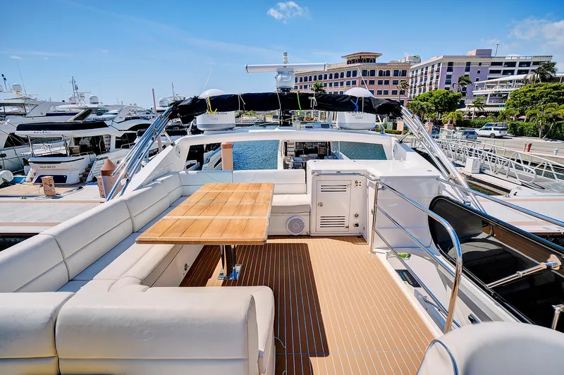 Slide: The Image of 2017 Sunseeker 68 Sport Yacht with spacious deck and luxurious seating. - 19