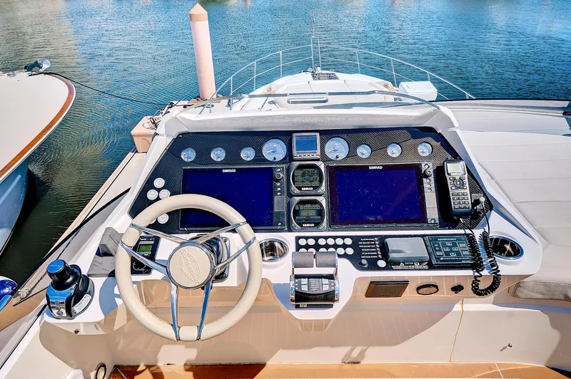 Slide: The Image of Cockpit of 2017 Sunseeker 68 Sport Yacht with advanced navigation systems. - 25