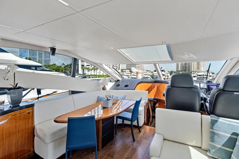 Slide: The Image of Luxurious interior of 2017 Sunseeker 68 Sport Yacht with modern seating and dining area. - 31