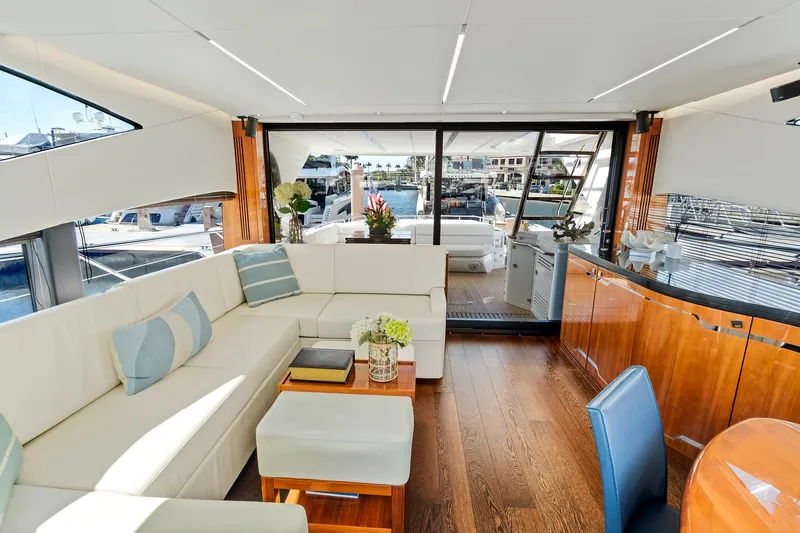 Slide: The Image of Luxurious interior of 2017 Sunseeker 68 Sport Yacht with white leather seating and wooden flooring. - 34