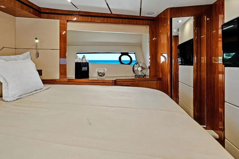 Slide: The Image of Luxurious bedroom interior of 2017 Sunseeker 68 Sport Yacht with wooden finishes. - 49
