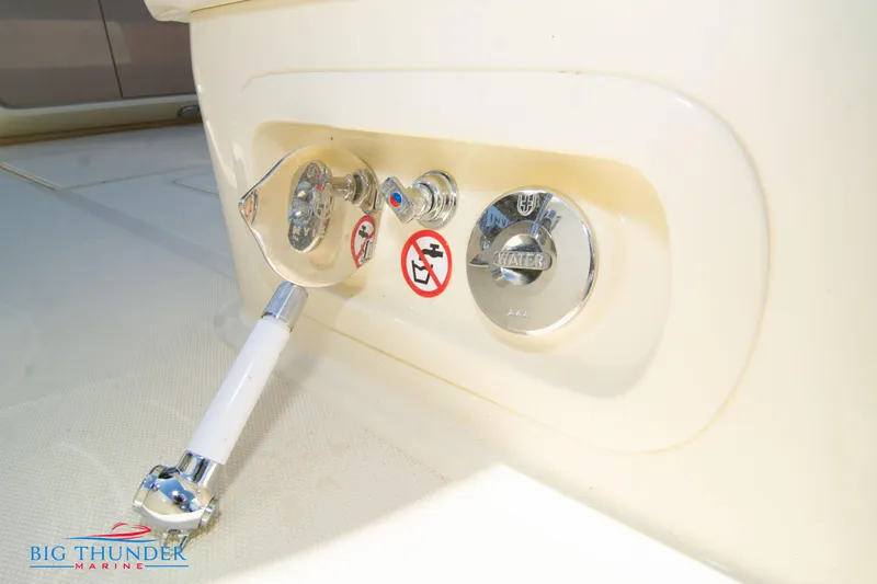 Slide: The Image of Control panel of 2024 Invictus GT320S boat with Big Thunder Marine logo. - 10