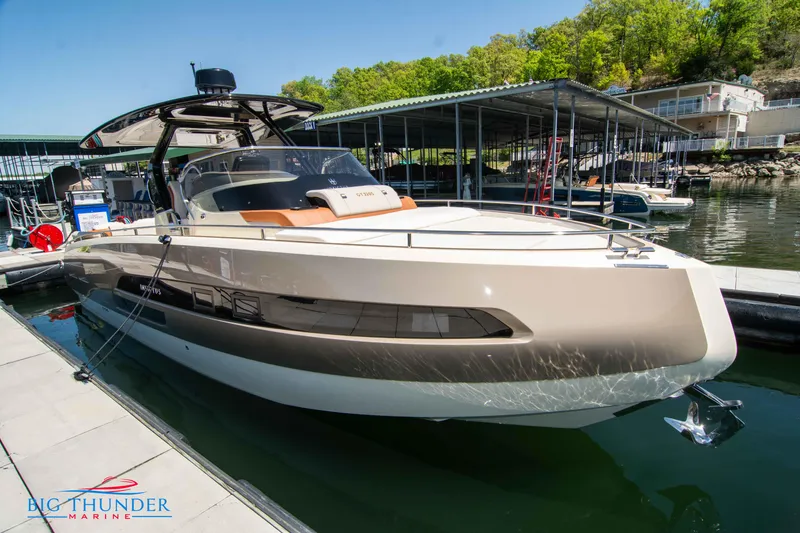 Slide: The Image of 2024 Invictus GT320S luxury yacht docked at marina. - 3