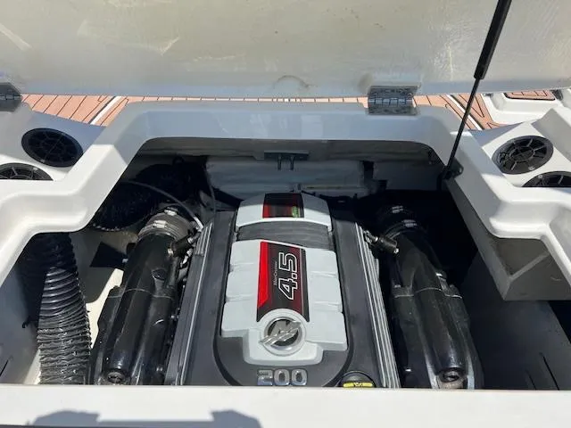 Slide: The Image of 2018 Sea Ray SPX 190 boat engine compartment with 4.5L 200 HP engine. - 12