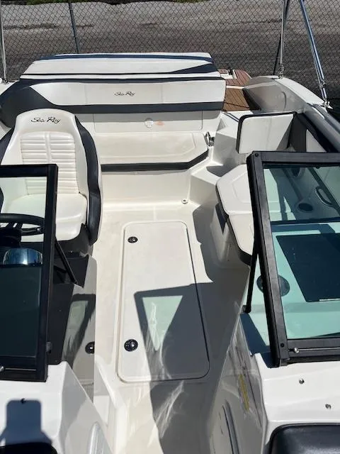 Slide: The Image of 2018 Sea Ray SPX 190 boat interior with seating and windshield. - 5