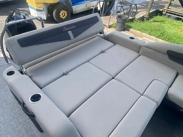 Slide: The Image of 2023 Barletta Cabrio 24 U boat with spacious, comfortable seating and cup holders. - 13