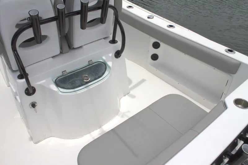 Slide: The Image of 2019 Cape Horn 22 OS boat interior with seating and rod holders. - 17