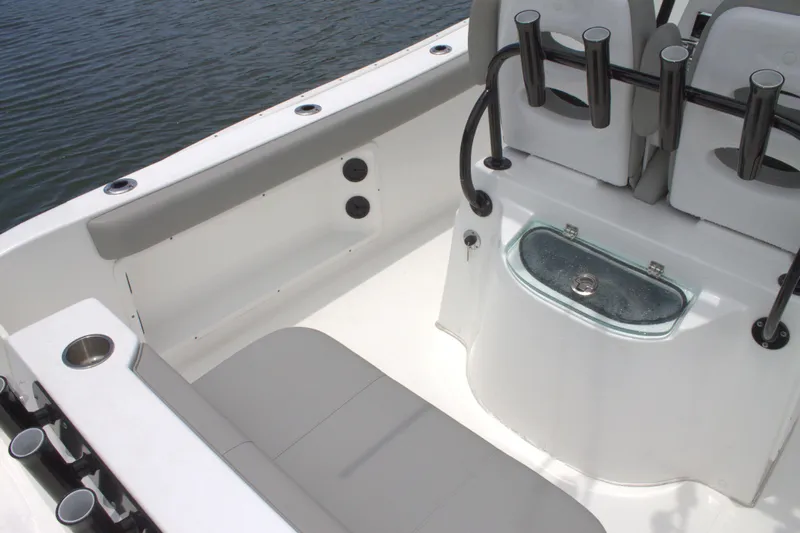 Slide: The Image of 2019 Cape Horn 22 OS boat interior with seating and rod holders. - 18