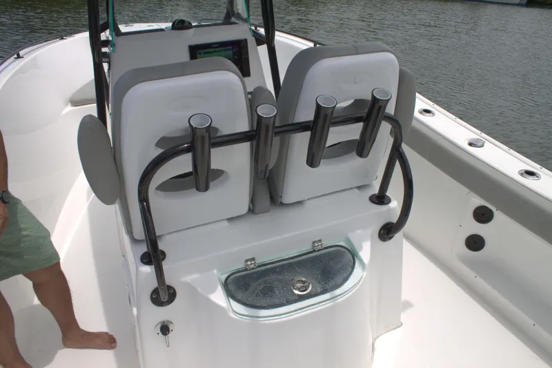 Slide: The Image of 2019 Cape Horn 22 OS boat interior with rod holders and livewell. - 20