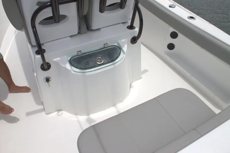 Slide: The Image of 2019 Cape Horn 22 OS boat interior with seating and storage. - 21