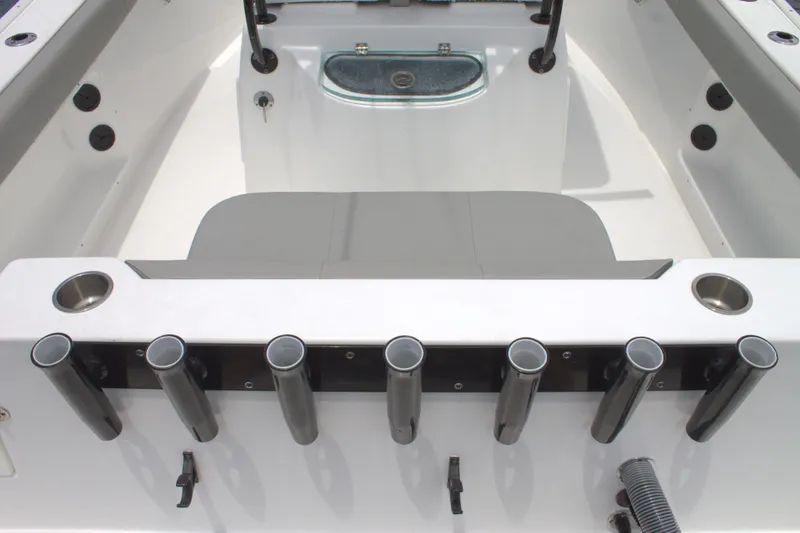 Slide: The Image of 2019 Cape Horn 22 OS boat interior with rod holders and seating. - 22