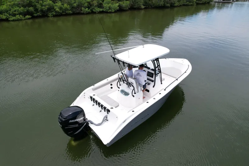 Slide: The Image of 2019 Cape Horn 22 OS boat on calm water with two people onboard. - 7