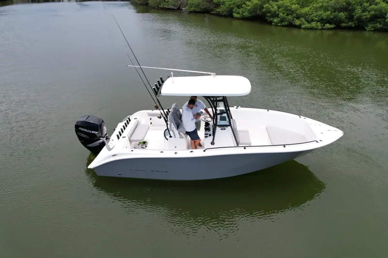 Slide: The Image of 2019 Cape Horn 22 OS boat on calm water with fishing gear. - 8