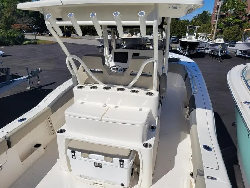 Slide: The Image of 2025 Key West 291 FS boat interior with console and seating. - 10
