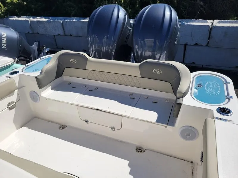 Slide: The Image of 2025 Key West 291 FS boat with dual Yamaha engines and spacious seating. - 12