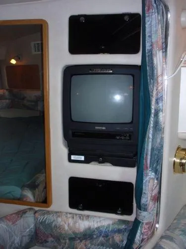 Slide: The Image of 1994 Sea Ray Sundancer 330 cabin interior with TV - 17