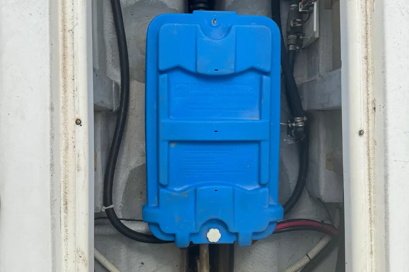 Slide: The Image of Blue electrical box in 1986 Luhrs Alura boat, surrounded by wiring. - 28