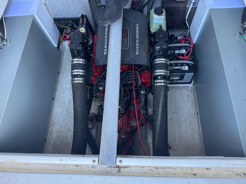 Slide: The Image of Engine compartment of a 1986 Luhrs Alura boat with Volvo Penta engines. - 29