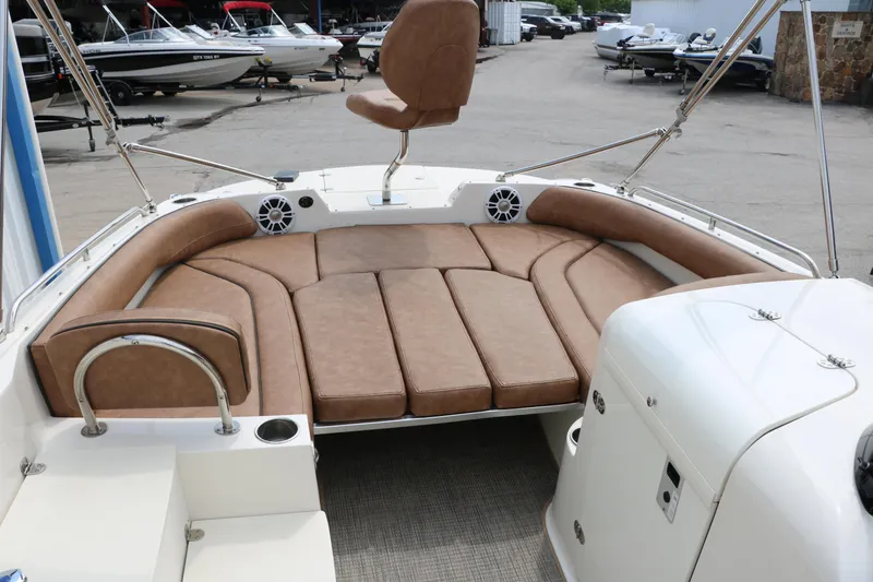 Slide: The Image of 2020 Stingray 212SC boat with spacious seating and modern design. - 22