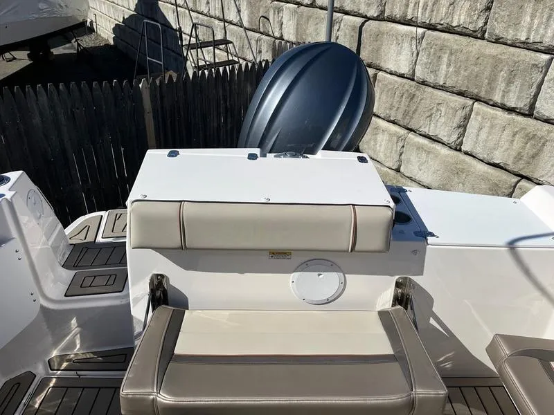 Slide: The Image of 2025 Cutwater C-248 C (COUPE) boat interior with seating and outboard motor. - 13