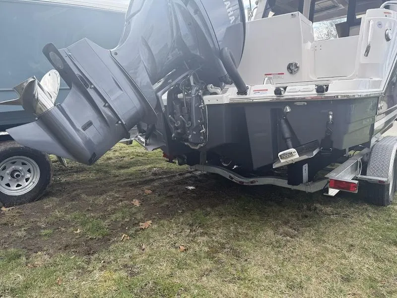 Slide: The Image of 2025 Cutwater C-248 C (COUPE) boat on trailer, featuring Yamaha outboard motor. - 4