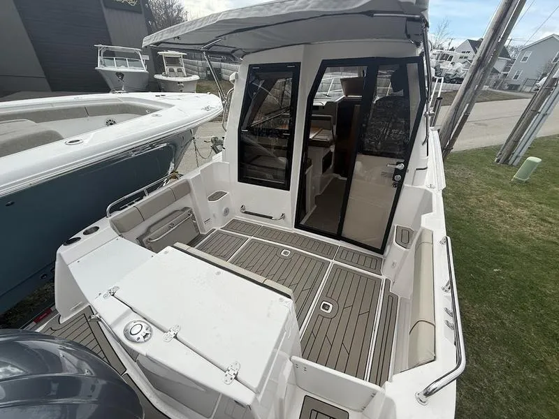 Slide: The Image of 2025 Cutwater C-248 C Coupe boat with open cockpit and modern design. - 6