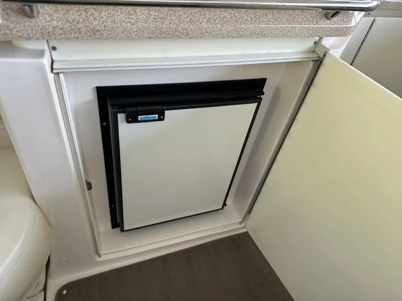 Slide: The Image of Compact refrigerator in 2004 Regal 3260 Commodore boat galley. - 16