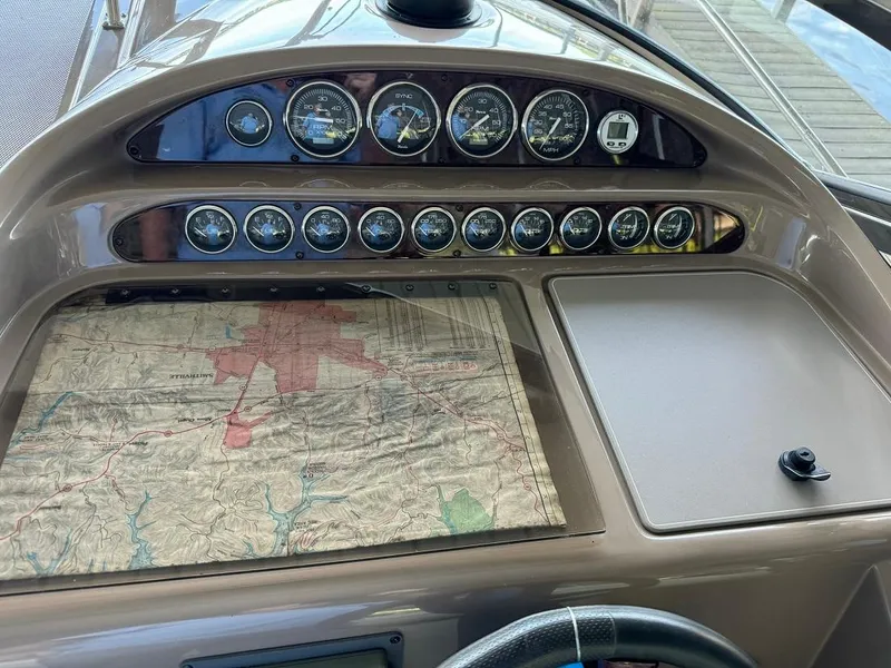 Slide: The Image of Control panel of a 2004 Regal 3260 Commodore boat with navigation map. - 23