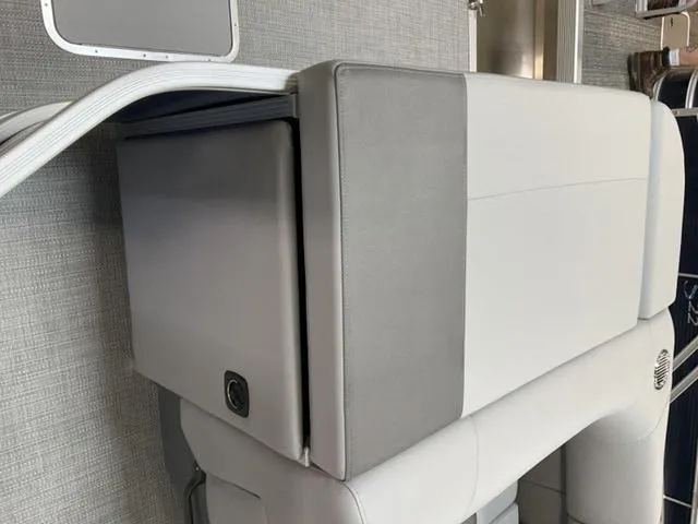 Slide: The Image of Control panel and safety warnings on a 2024 Bennington 22 SVL boat. - 14