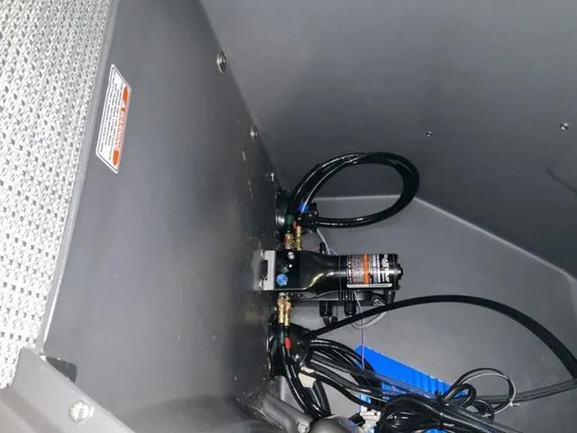 Slide: The Image of 2024 Bennington 22 SVL boat interior wiring and components. - 17