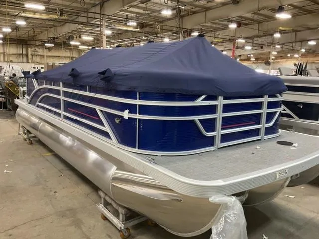 Slide: The Image of 2024 Bennington 22 SVL pontoon boat with interior layout and seating arrangement. - 6