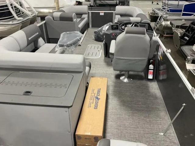 Slide: The Image of 2024 Bennington 22 SVS boat seat in gray and white upholstery. - 12