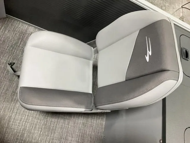 Slide: The Image of 2024 Bennington 22 SVS boat interior with storage compartment and Tumacs Covers box. - 14