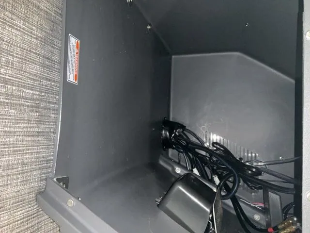 Slide: The Image of Storage compartment of 2024 Bennington 22 SVS boat with bag inside. - 20