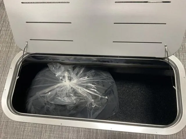 Slide: The Image of 2024 Bennington 22 SVS boat interior seating in gray and white. - 21