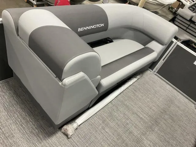 Slide: The Image of 2024 Bennington 22 SVS boat interior with gray and white seating. - 22