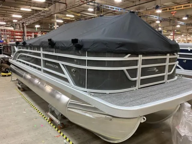 Slide: The Image of 2024 Bennington 22 SVS pontoon boat with interior layout and seating arrangement. - 7
