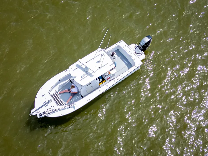 Slide: The Image of Aerial view of 2017 Custom Carolina Style boat on water. - 11