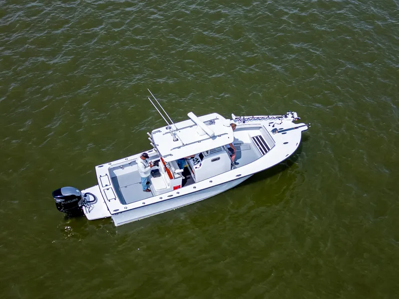 Slide: The Image of Aerial view of 2017 Custom Carolina Style boat on water. - 9