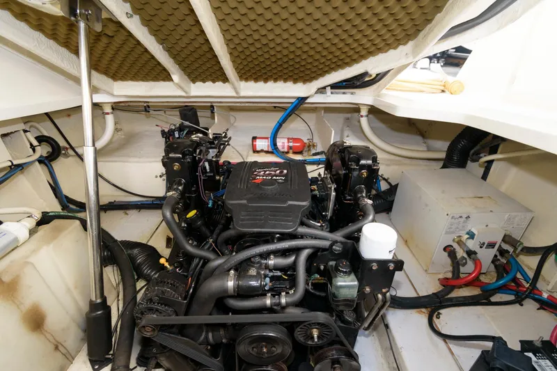 Slide: The Image of Engine compartment of a 2005 Sea Ray 260 Sundancer boat. - 10
