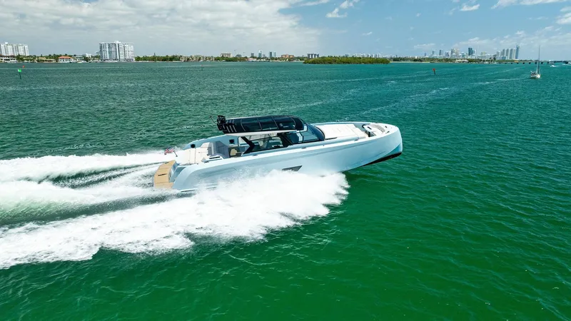 Slide: The Image of 2022 Vanquish Yachts VQ58 cruising on open water. - 23