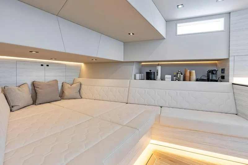 Slide: The Image of Luxurious interior of 2022 Vanquish Yachts VQ58 with modern seating and amenities. - 36