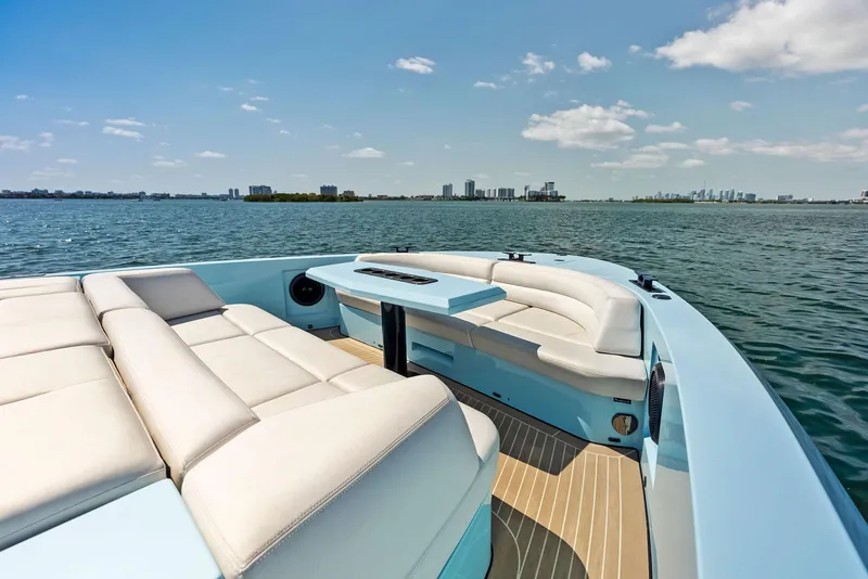 Slide: The Image of 2022 Vanquish Yachts VQ58 luxury yacht with spacious seating and scenic ocean view. - 48