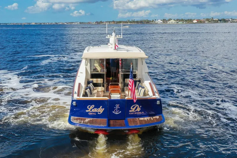 Slide: The Image of 2007 Oyster LD43 yacht cruising on open water, rear view. - 14