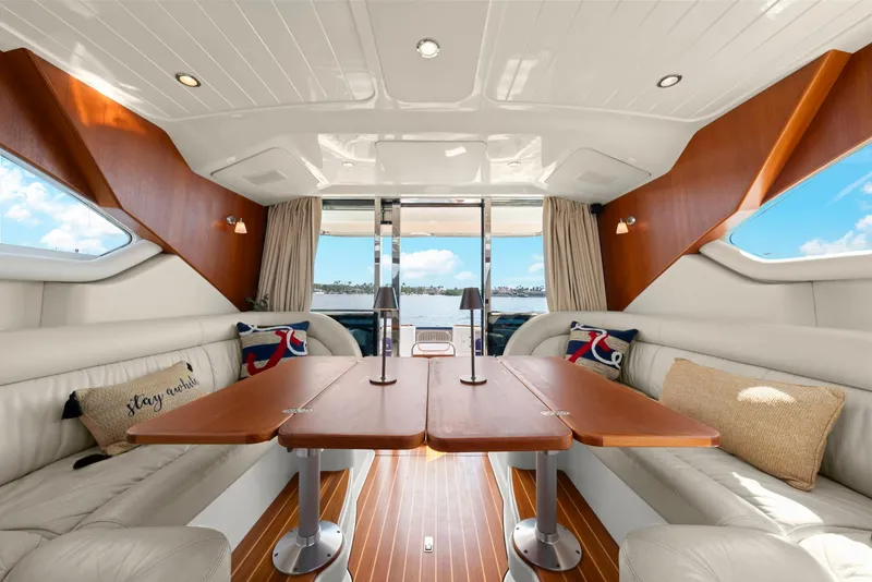 Slide: The Image of Luxurious interior of 2007 Oyster LD43 yacht with elegant seating and wooden table. - 30