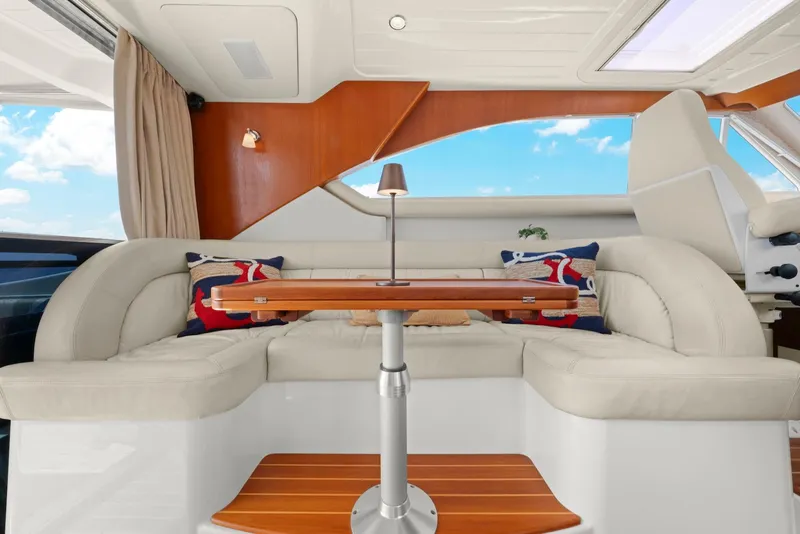 Slide: The Image of Luxurious interior of 2007 Oyster LD43 yacht with elegant seating and wooden table. - 34